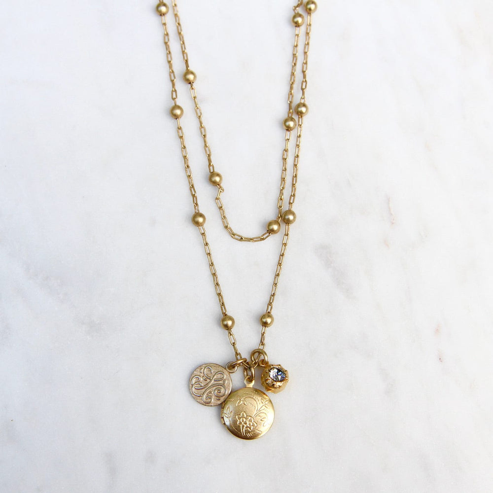 
                  
                    NKL-JM Small Locket Necklace - Gold Plate
                  
                