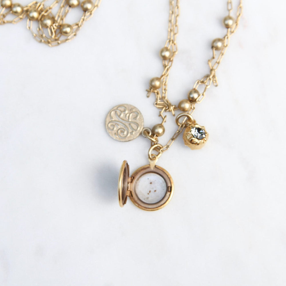 
                  
                    NKL-JM Small Locket Necklace - Gold Plate
                  
                