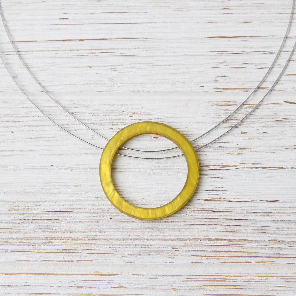 
                  
                    NKL-JM Sunglow Resin Circle Pendant
                  
                