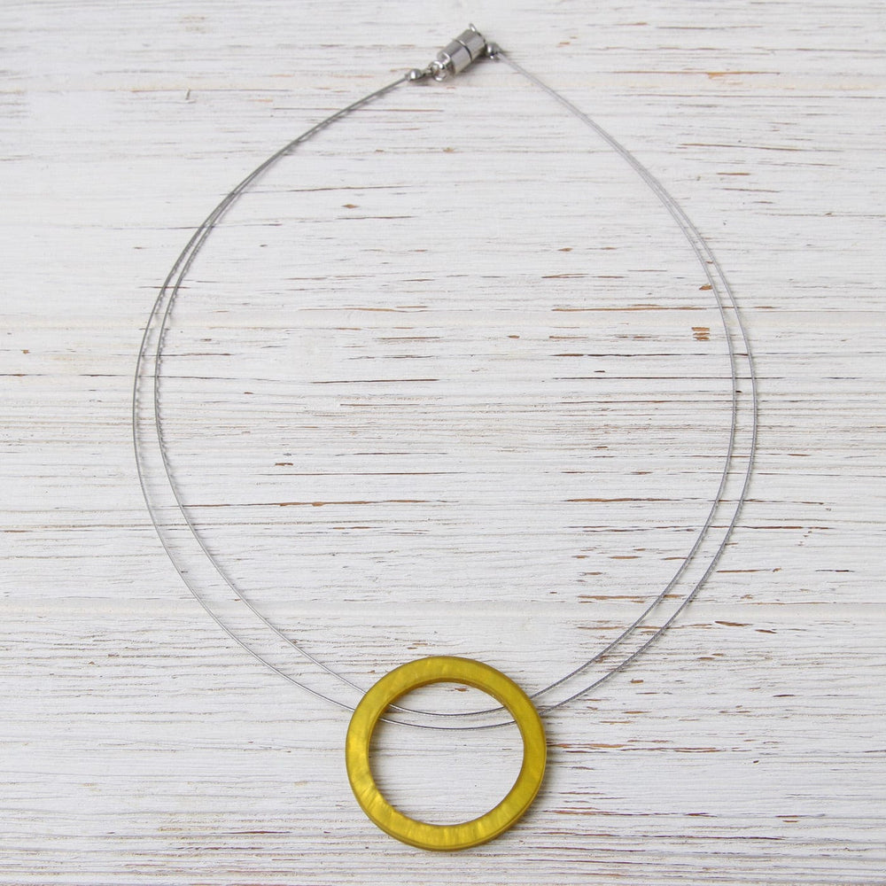 
                  
                    NKL-JM Sunglow Resin Circle Pendant
                  
                