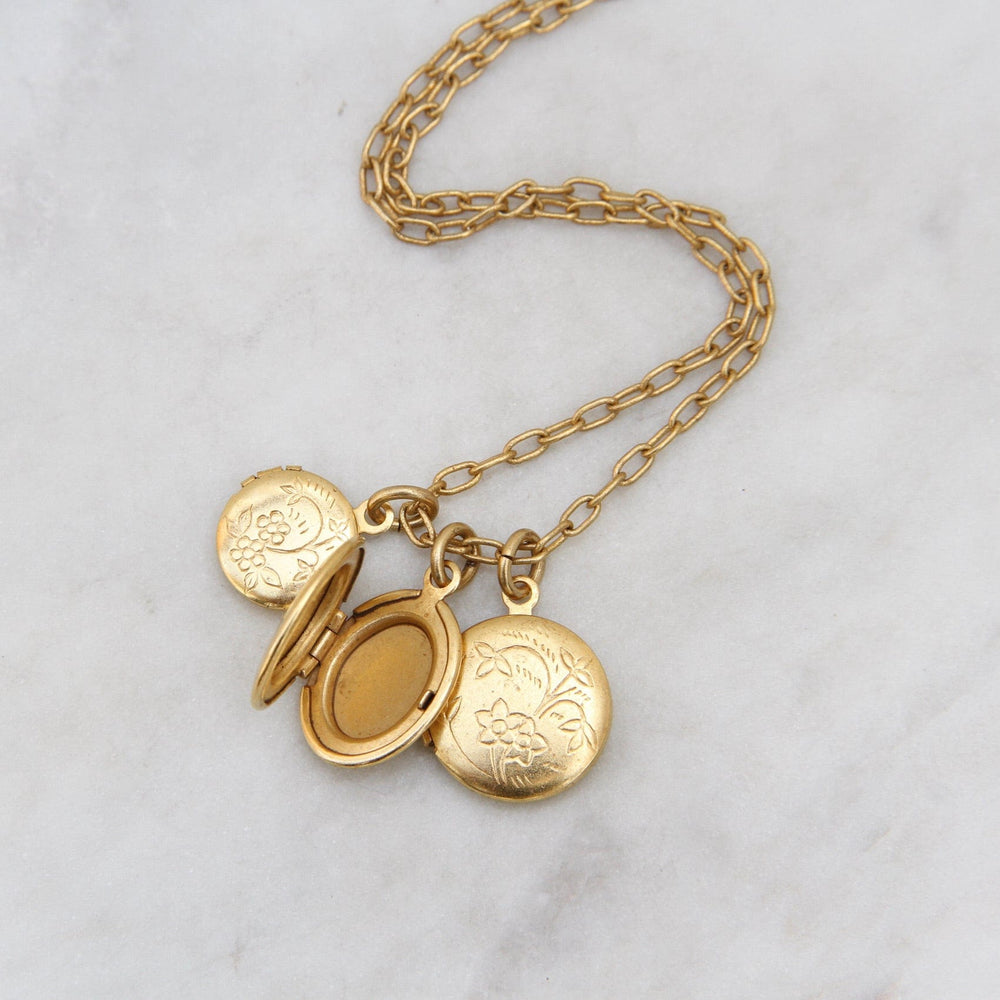 
                  
                    NKL-JM Triple Locket Necklace - Gold Plate
                  
                