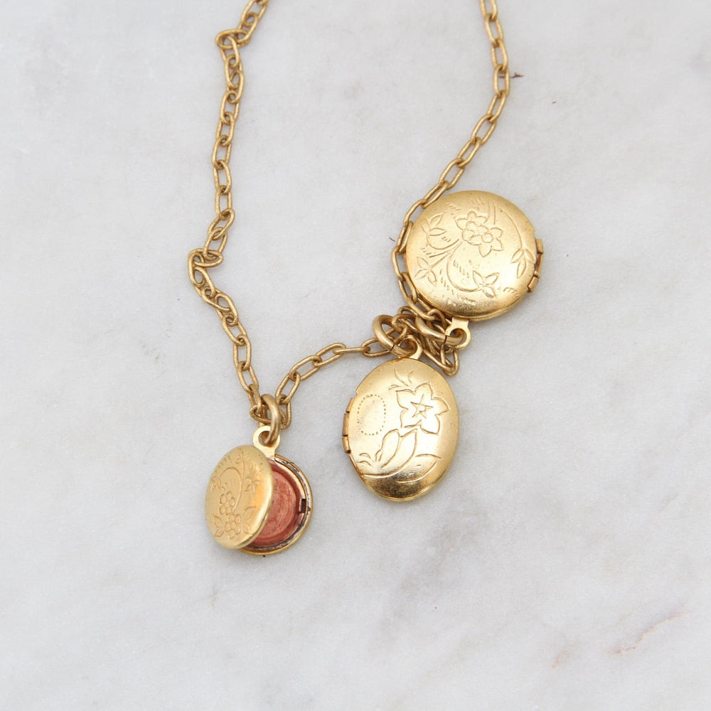 
                  
                    NKL-JM Triple Locket Necklace - Gold Plate
                  
                