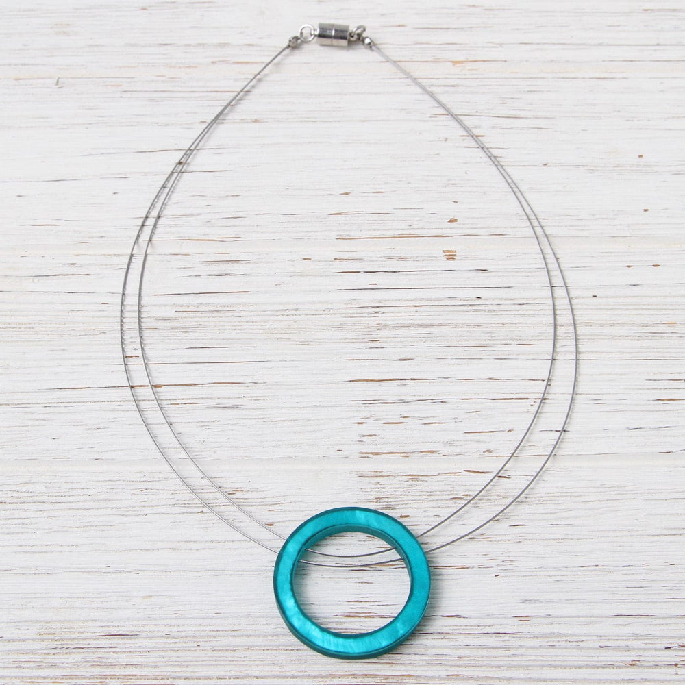 
                  
                    NKL-JM Turquoise Resin Circle Pendant
                  
                