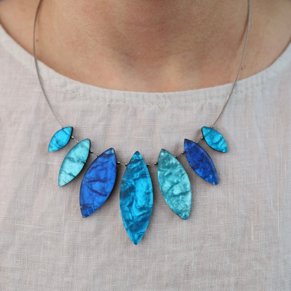 
                  
                    NKL-JM Turquoise Tribal Leaf Necklace
                  
                