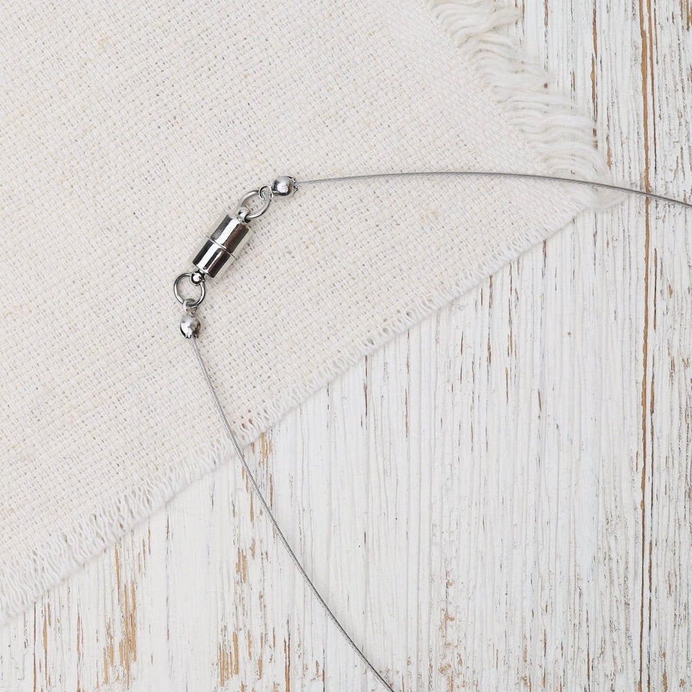 
                      
                        NKL-JM White Drop Circle Pendant
                      
                    