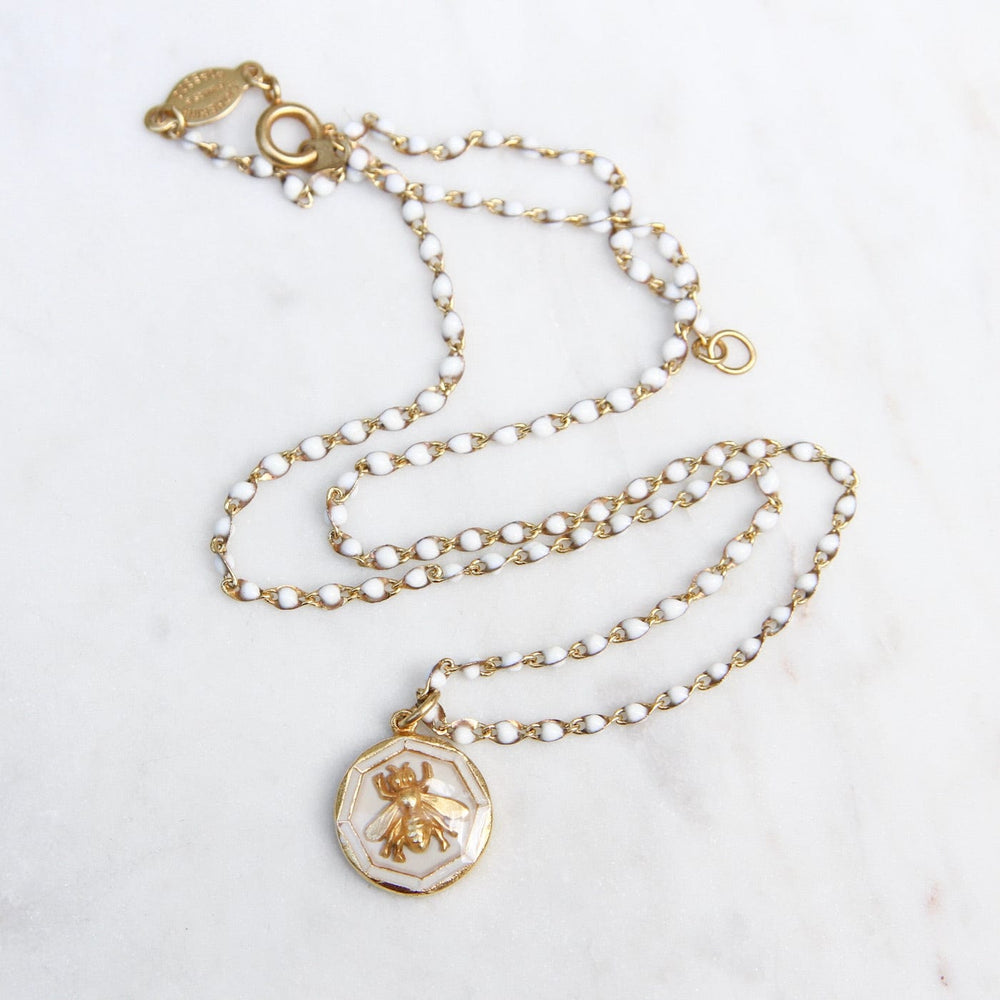 
                  
                    NKL-JM White Enamel Bee Charm Necklace
                  
                