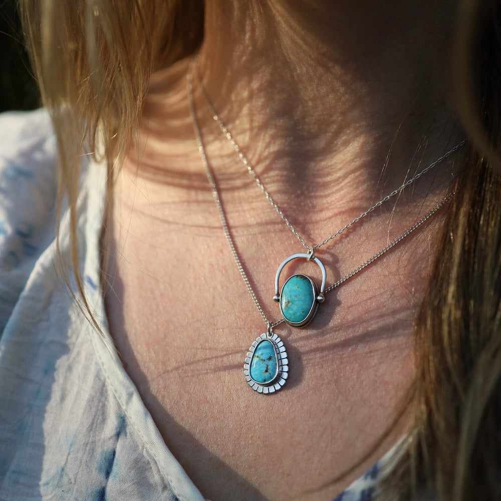 
                      
                        NKL Kingman Turquoise Pendant Necklace
                      
                    