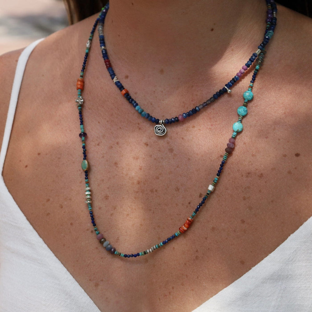 
                      
                        NKL Kyanite with Spiral Rose Pendant Necklace
                      
                    