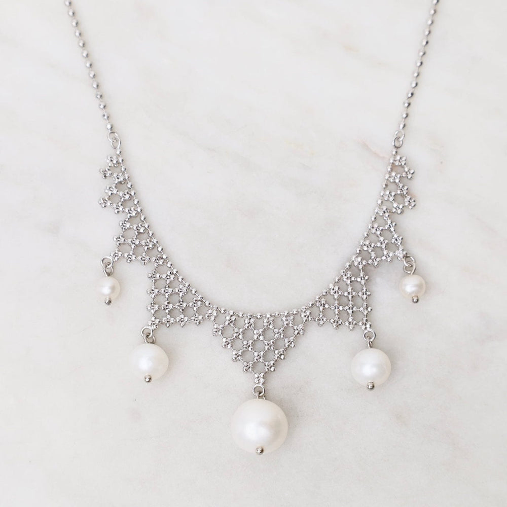 
                      
                        NKL Lace Points with White Pearls Necklace
                      
                    