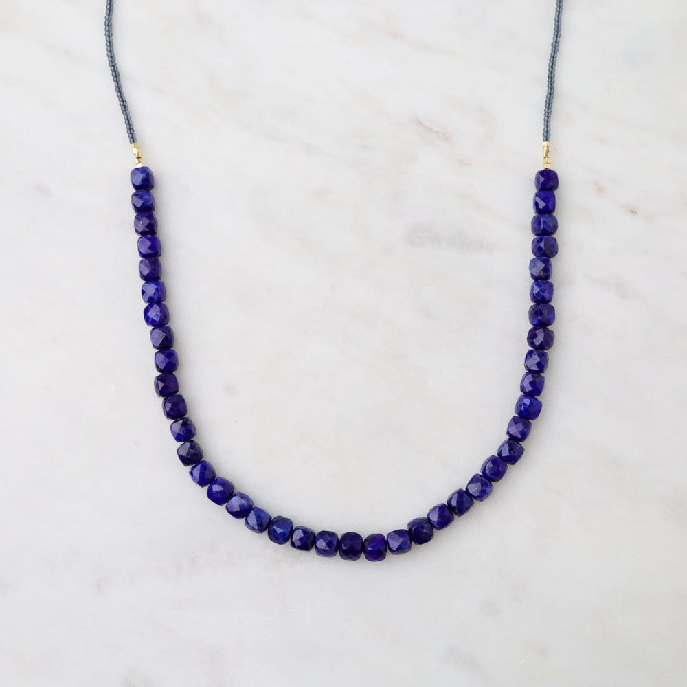 
                  
                    NKL Lapis Cubes Necklace
                  
                