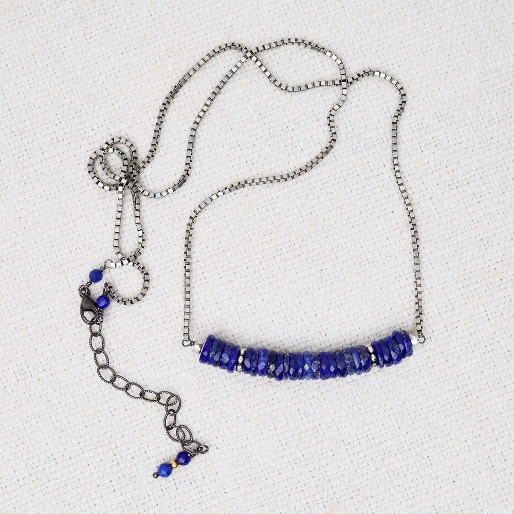 
                  
                    NKL Lapis Sequins with sterling trim on 21` Sterling S
                  
                