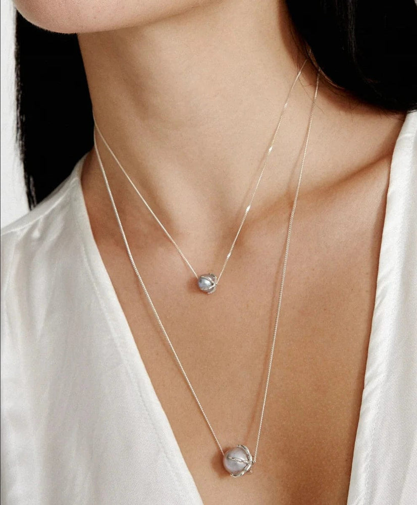 
                      
                        NKL Lark Necklace Grey Pearl
                      
                    