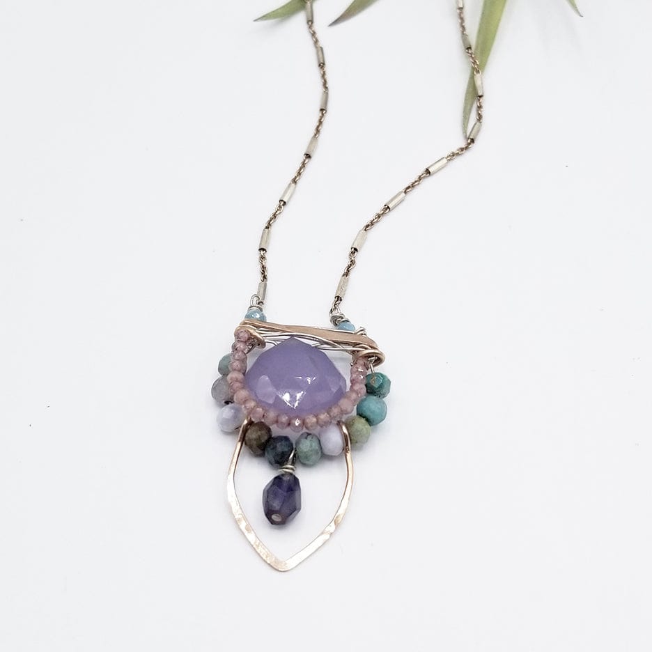 
                  
                    NKL LAVENDER CHALCEDONY SURROUNDED BY PINK TOURMALINE AND CHRYSOCOLLA NECKLACE
                  
                