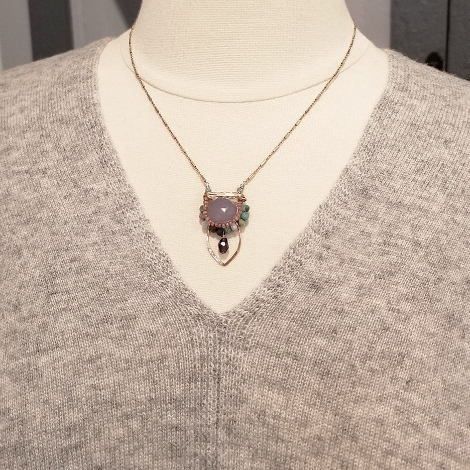 
                  
                    NKL LAVENDER CHALCEDONY SURROUNDED BY PINK TOURMALINE AND CHRYSOCOLLA NECKLACE
                  
                