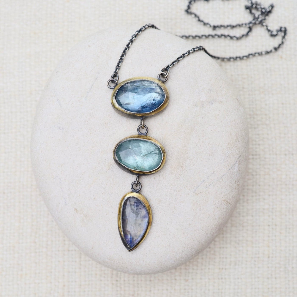 
                      
                        NKL Light Blues Crescent Rim Drop Necklace
                      
                    