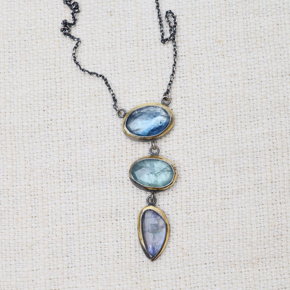 
                      
                        NKL Light Blues Crescent Rim Drop Necklace
                      
                    