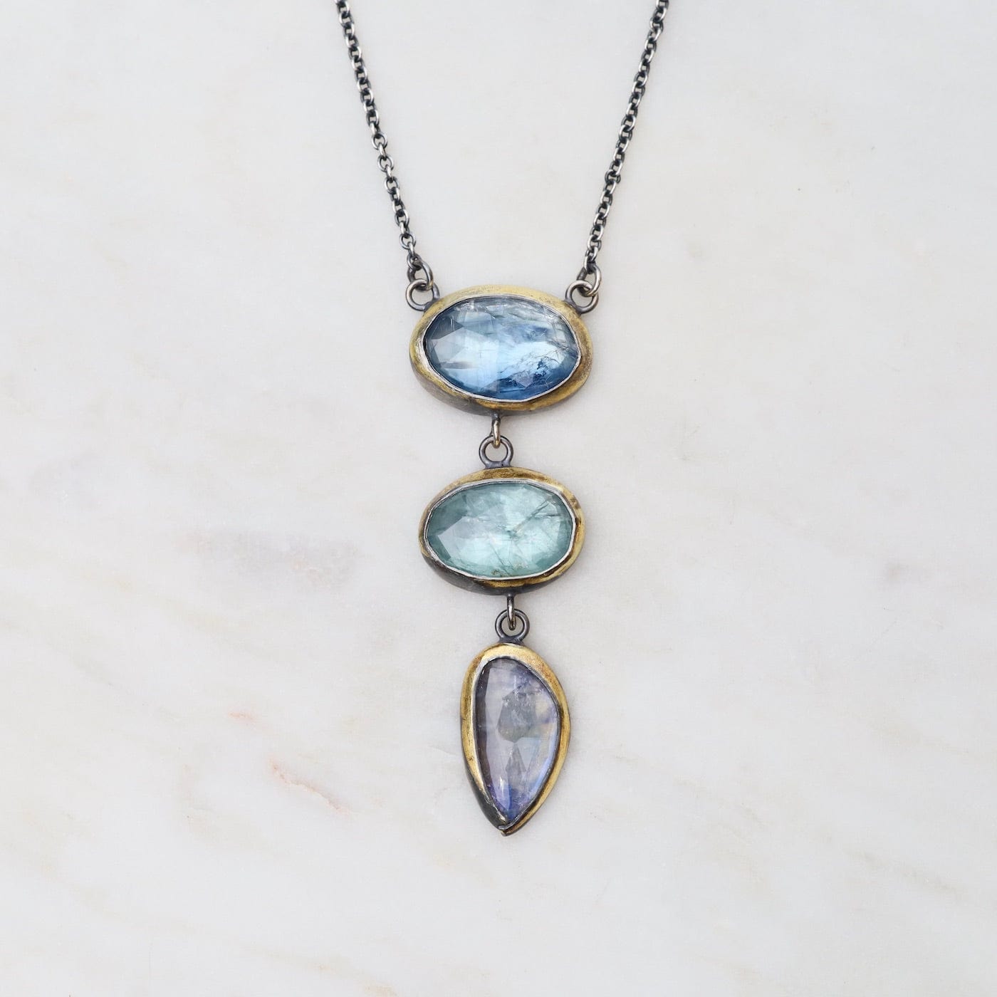 NKL Light Blues Crescent Rim Drop Necklace