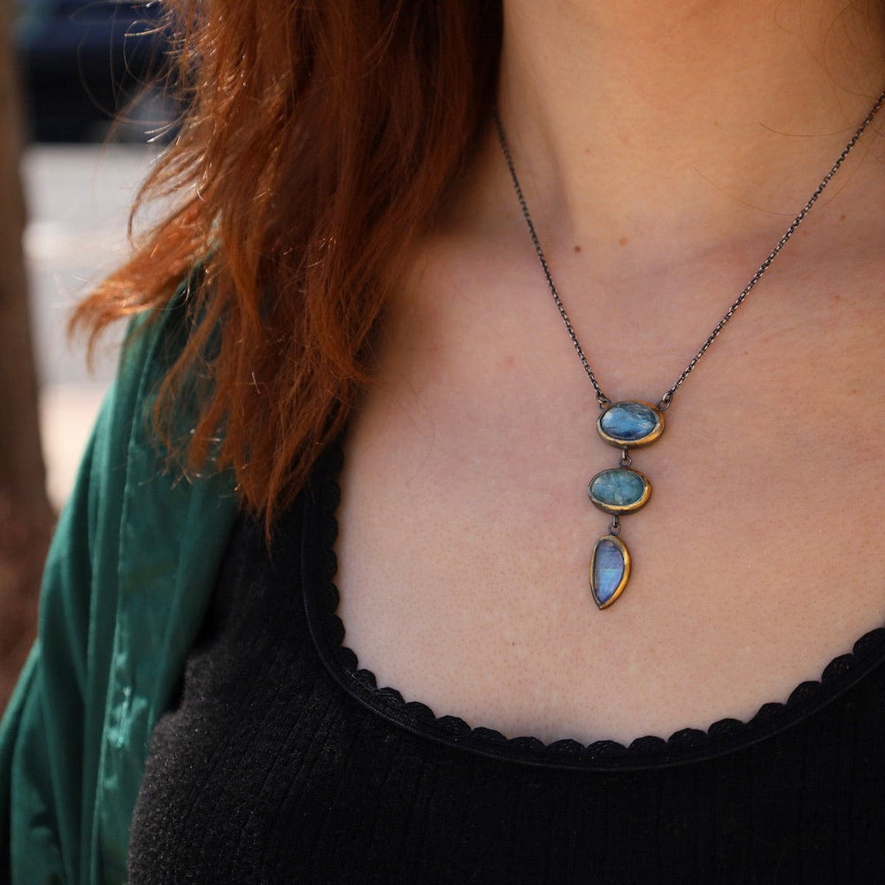 
                      
                        NKL Light Blues Crescent Rim Drop Necklace
                      
                    