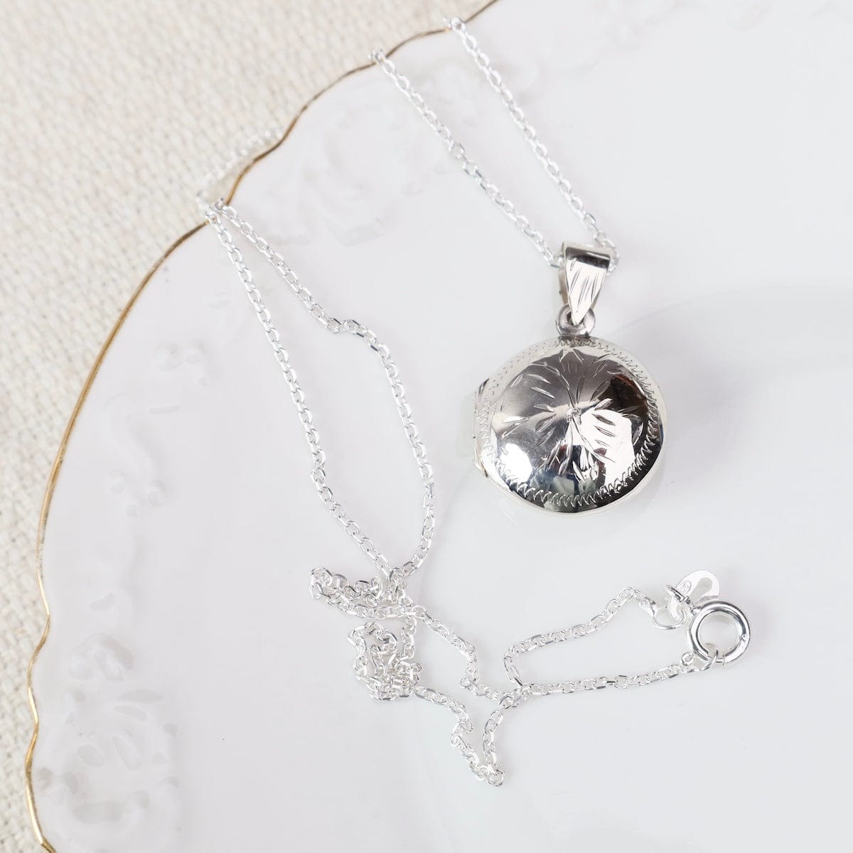 NKL Lightly Etched Flower on Plump Round Locket Necklace