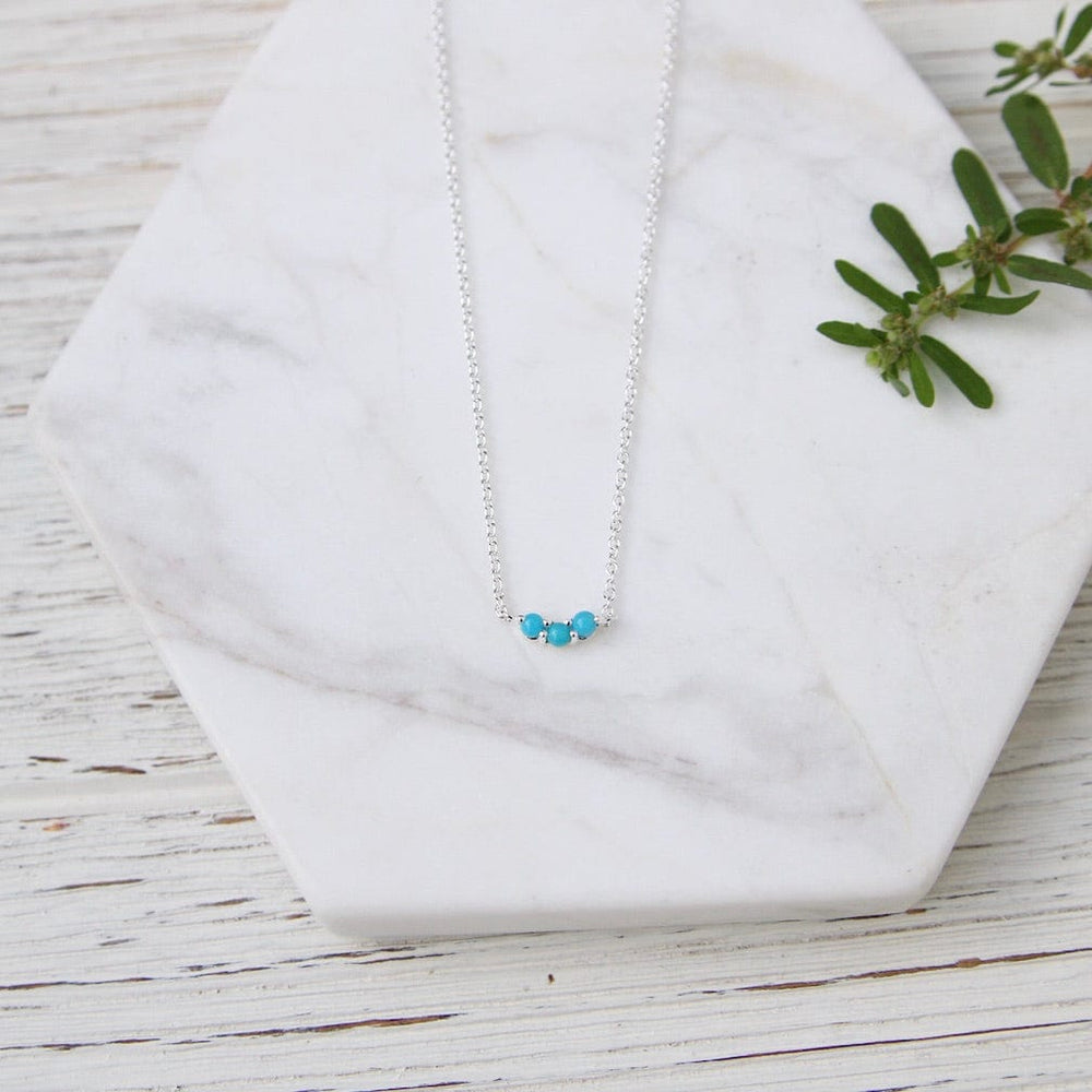 
                      
                        NKL Little Curved Turquoise Necklace
                      
                    