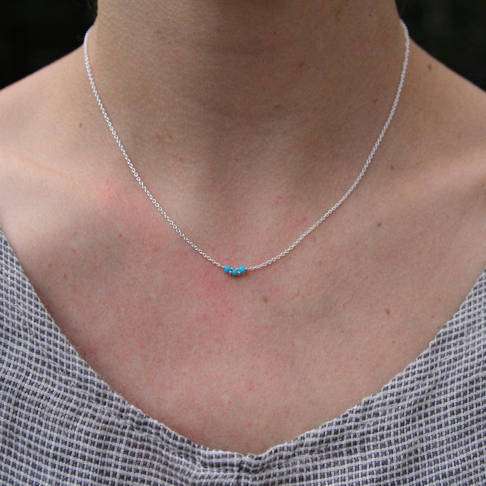 
                      
                        NKL Little Curved Turquoise Necklace
                      
                    