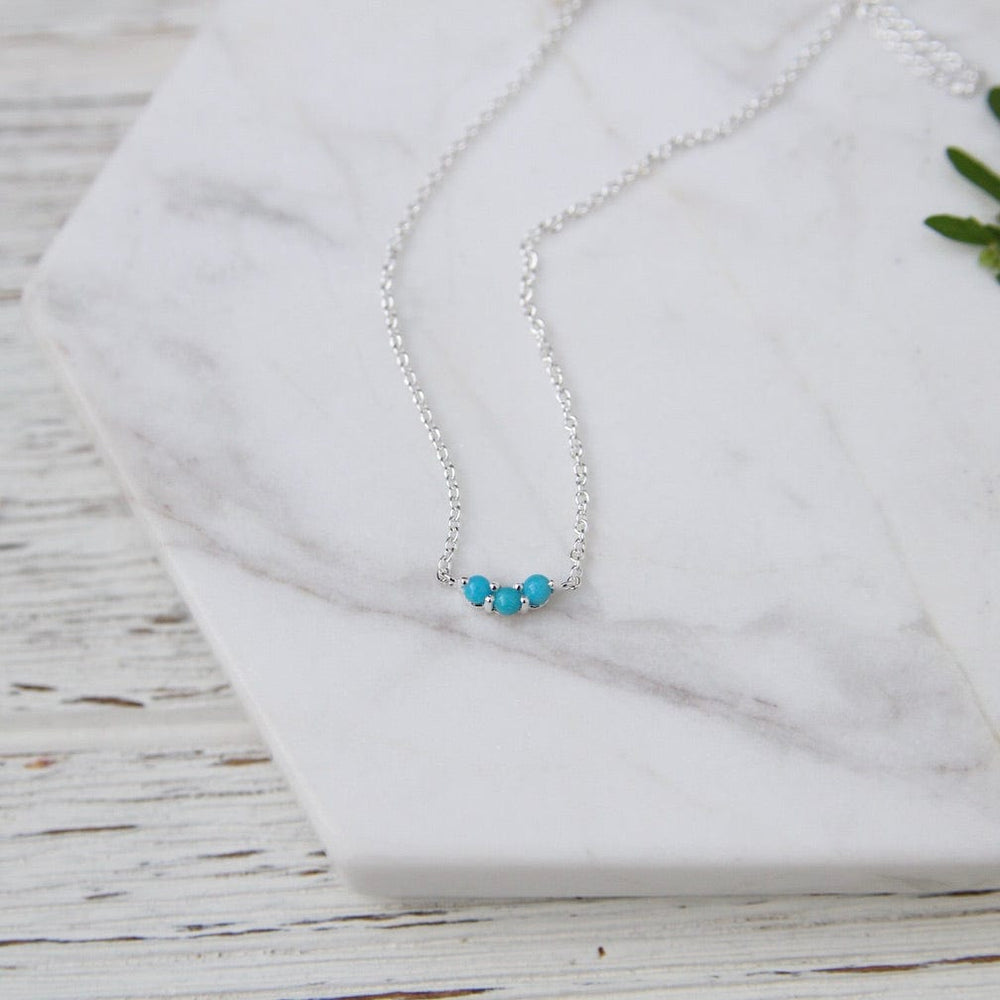 
                      
                        NKL Little Curved Turquoise Necklace
                      
                    