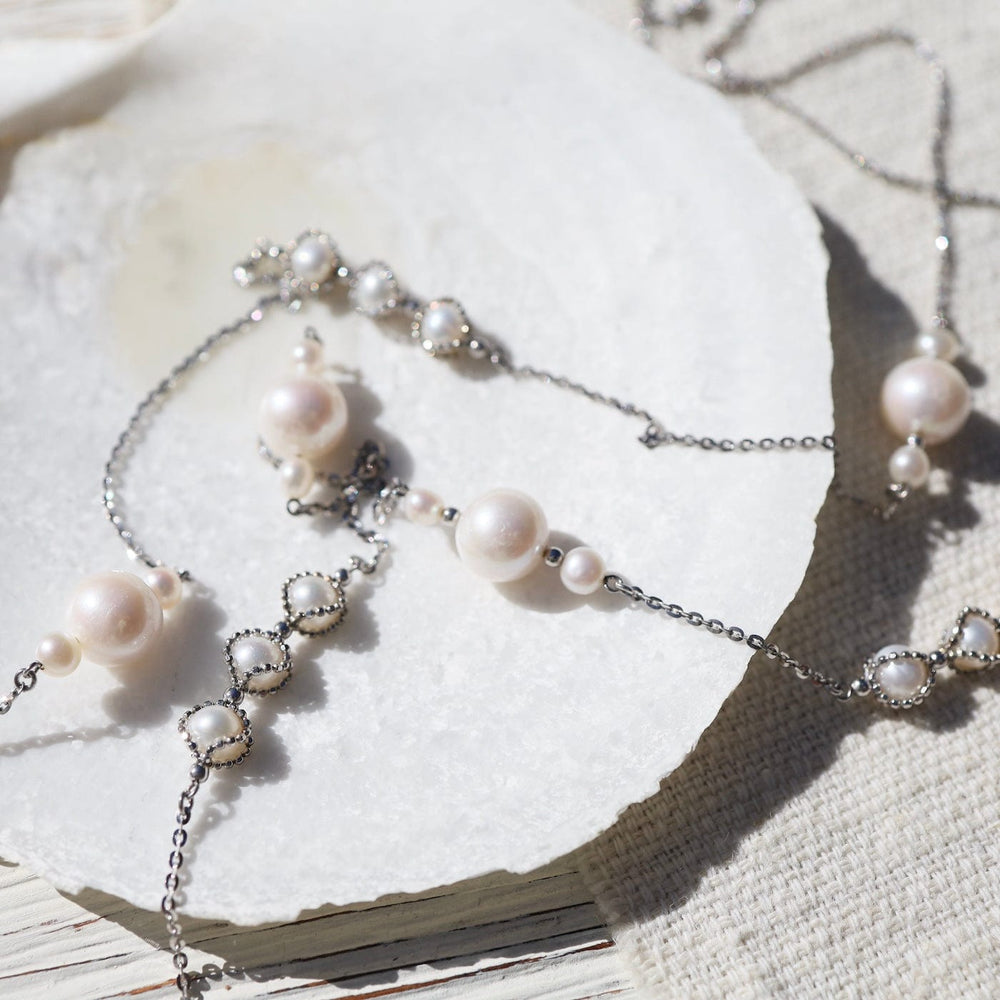 
                  
                    NKL Long Asymmetrical Pearl Station Necklace
                  
                