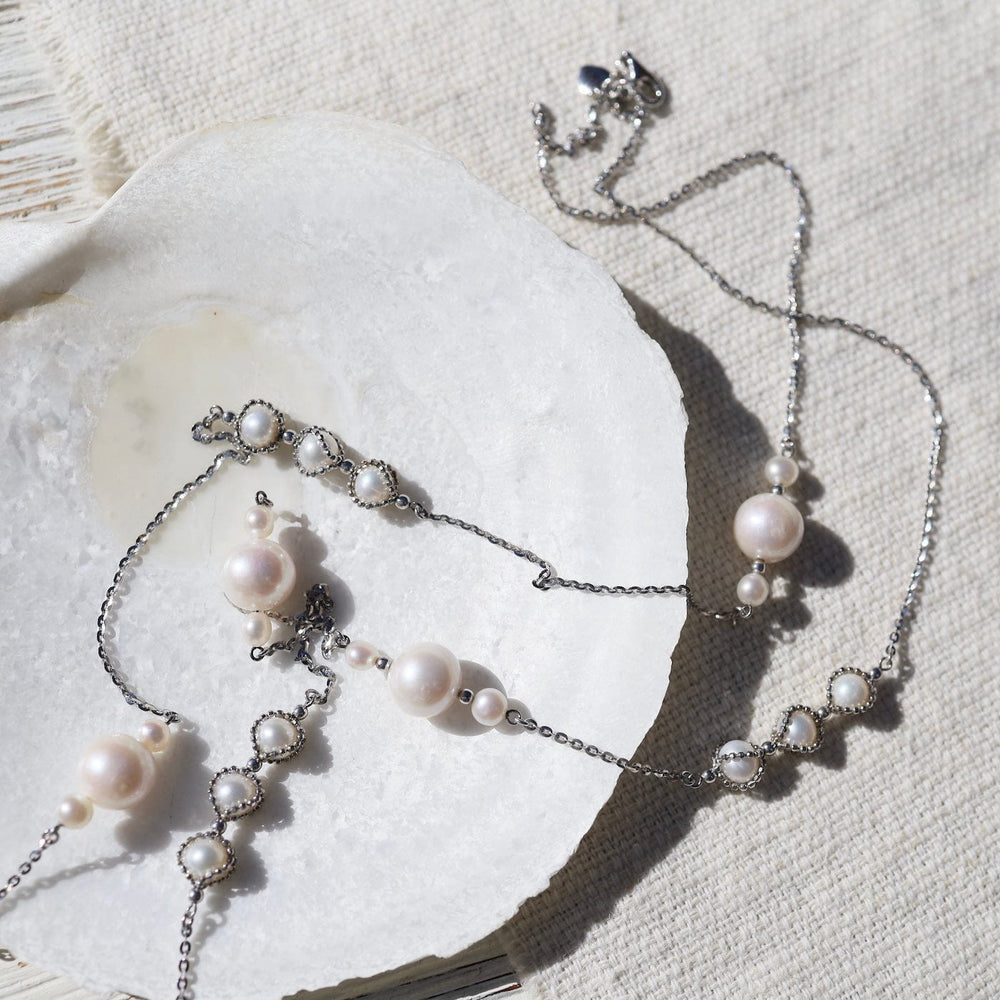 
                  
                    NKL Long Asymmetrical Pearl Station Necklace
                  
                