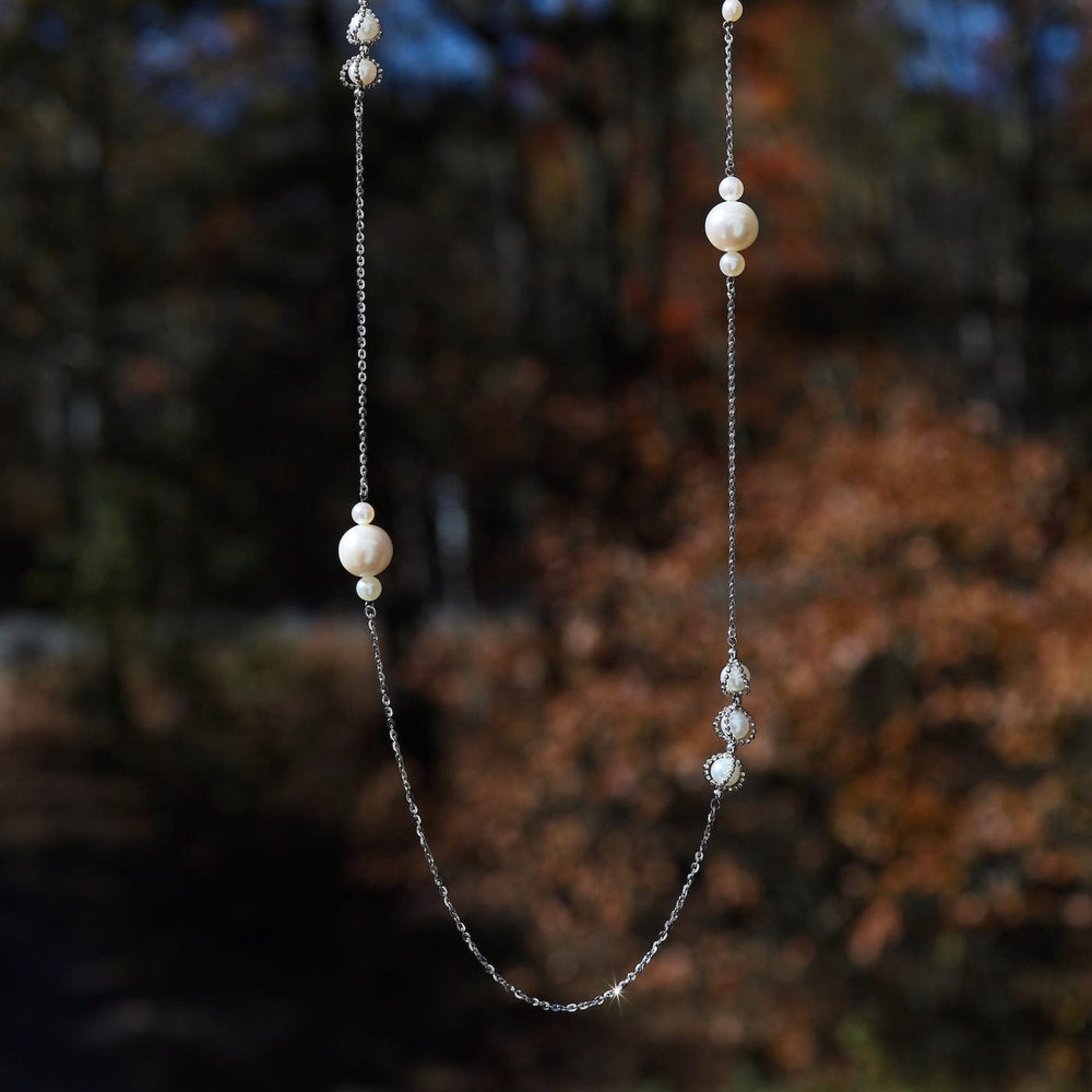 
                  
                    NKL Long Asymmetrical Pearl Station Necklace
                  
                