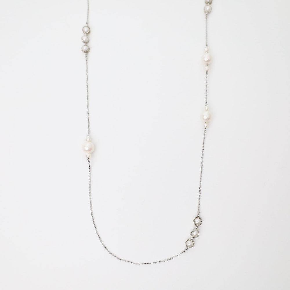 
                  
                    NKL Long Asymmetrical Pearl Station Necklace
                  
                