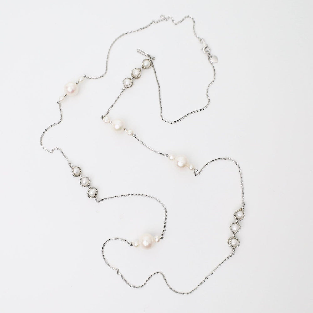 
                  
                    NKL Long Asymmetrical Pearl Station Necklace
                  
                