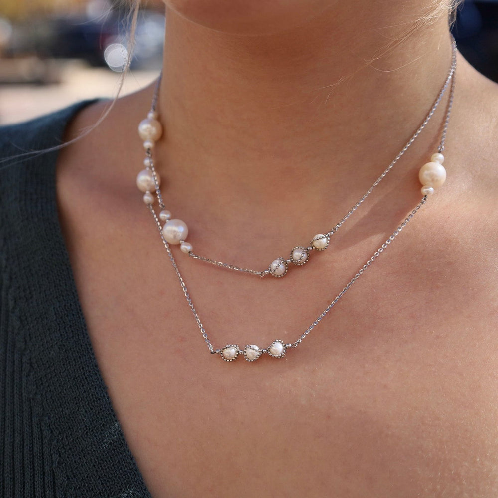 
                  
                    NKL Long Asymmetrical Pearl Station Necklace
                  
                