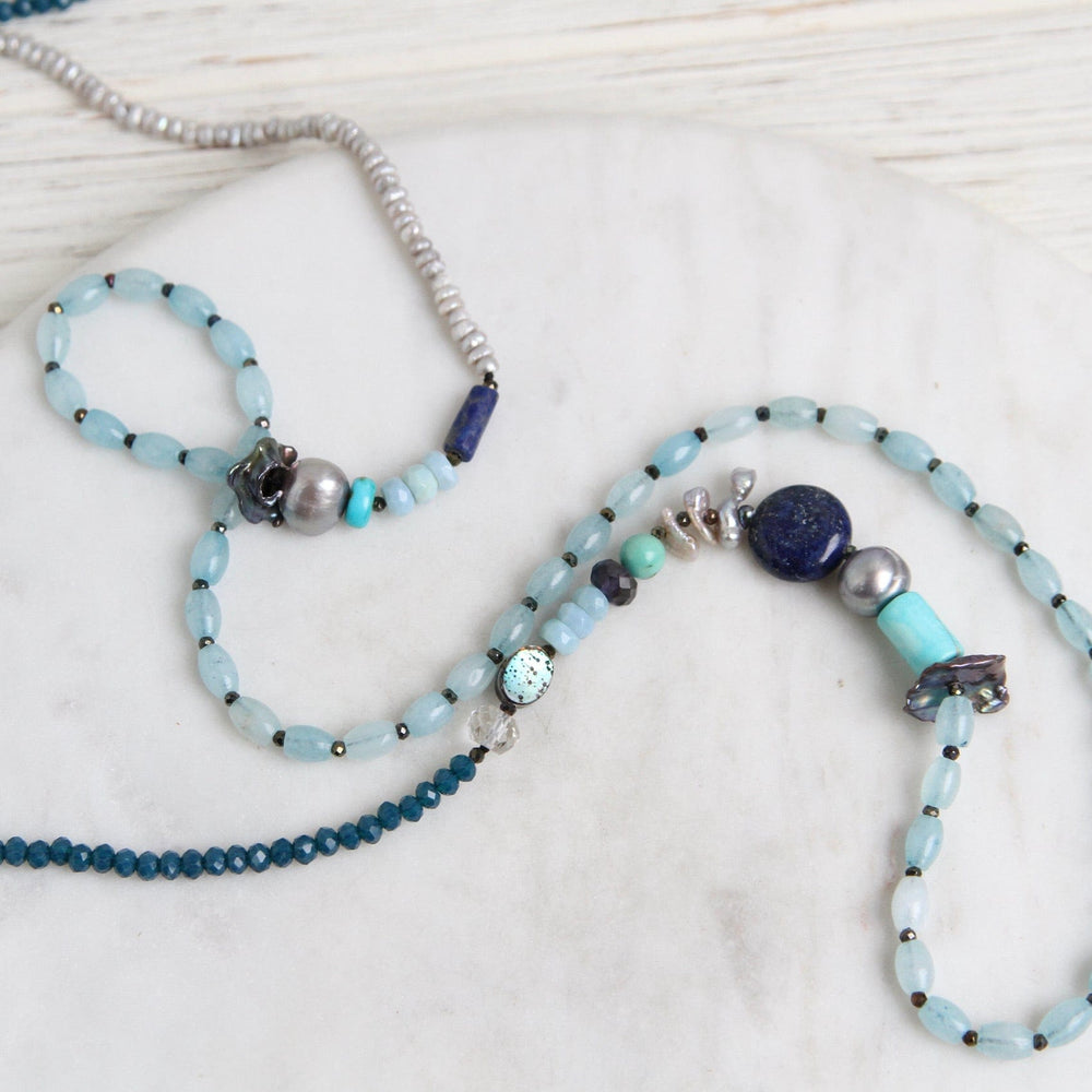 
                      
                        NKL Long Blue Mix Necklace
                      
                    