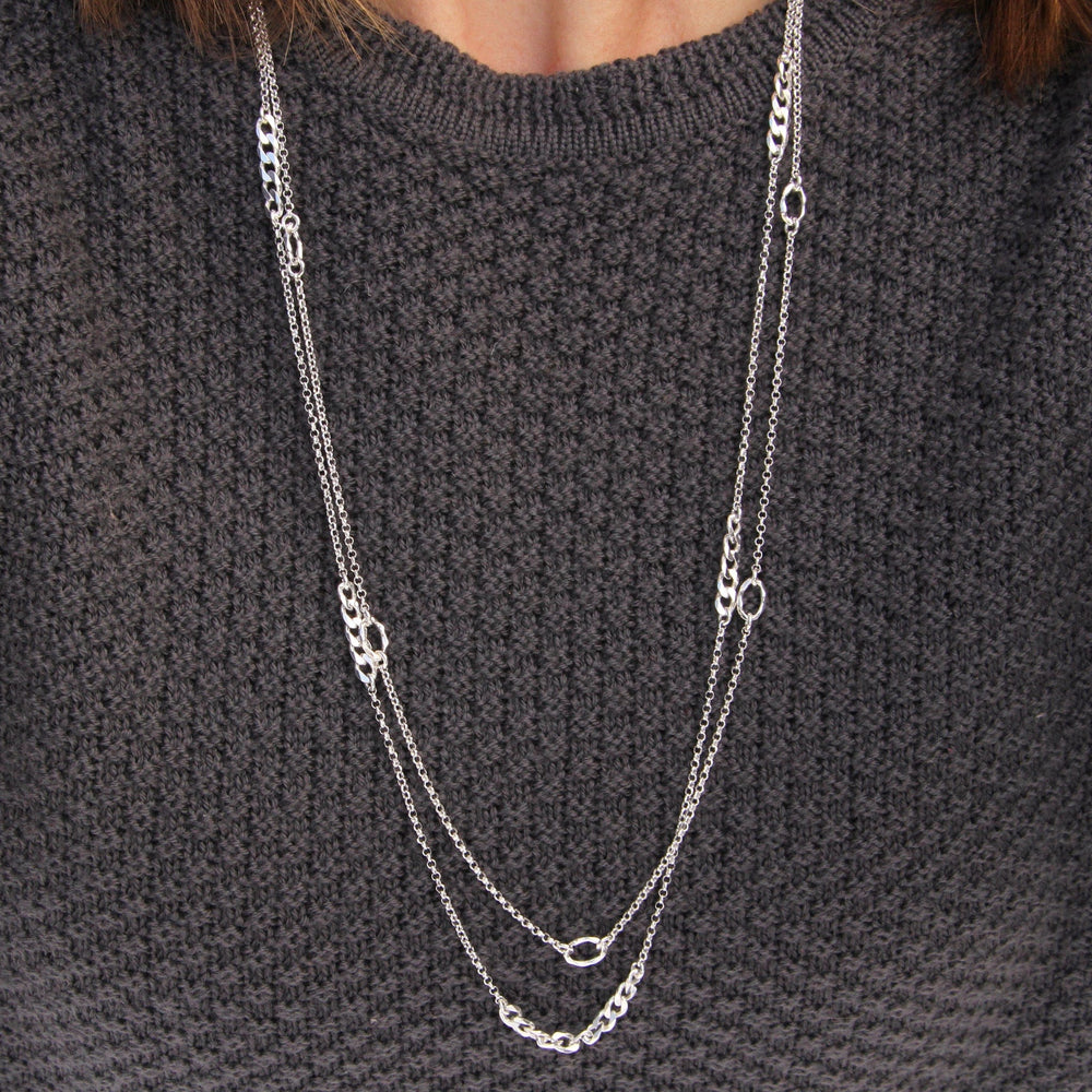 
                  
                    NKL Long Chain with Hammered Oval Stations
                  
                