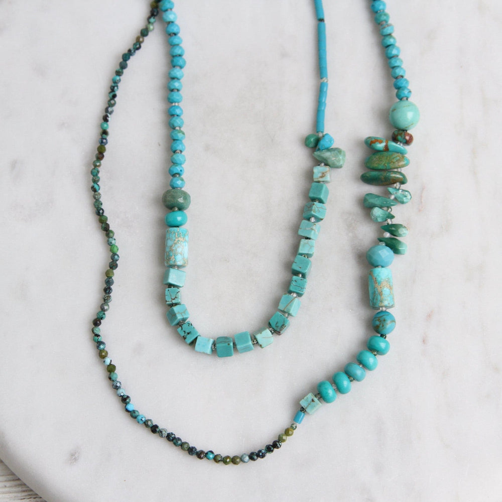 
                  
                    NKL Long Turquoise Mix Necklace
                  
                