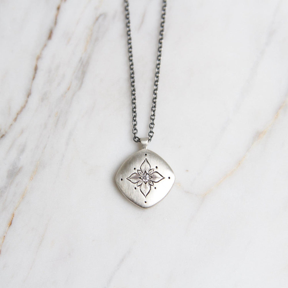 
                      
                        NKL Lotus Cushion Pendant in Diamond
                      
                    