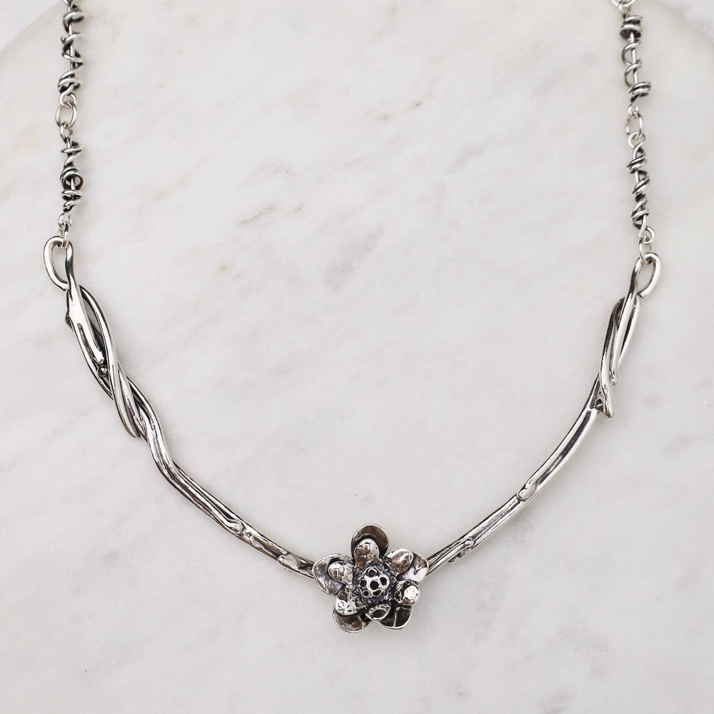 
                  
                    NKL Lotus Vine Necklace - Small Lotus
                  
                