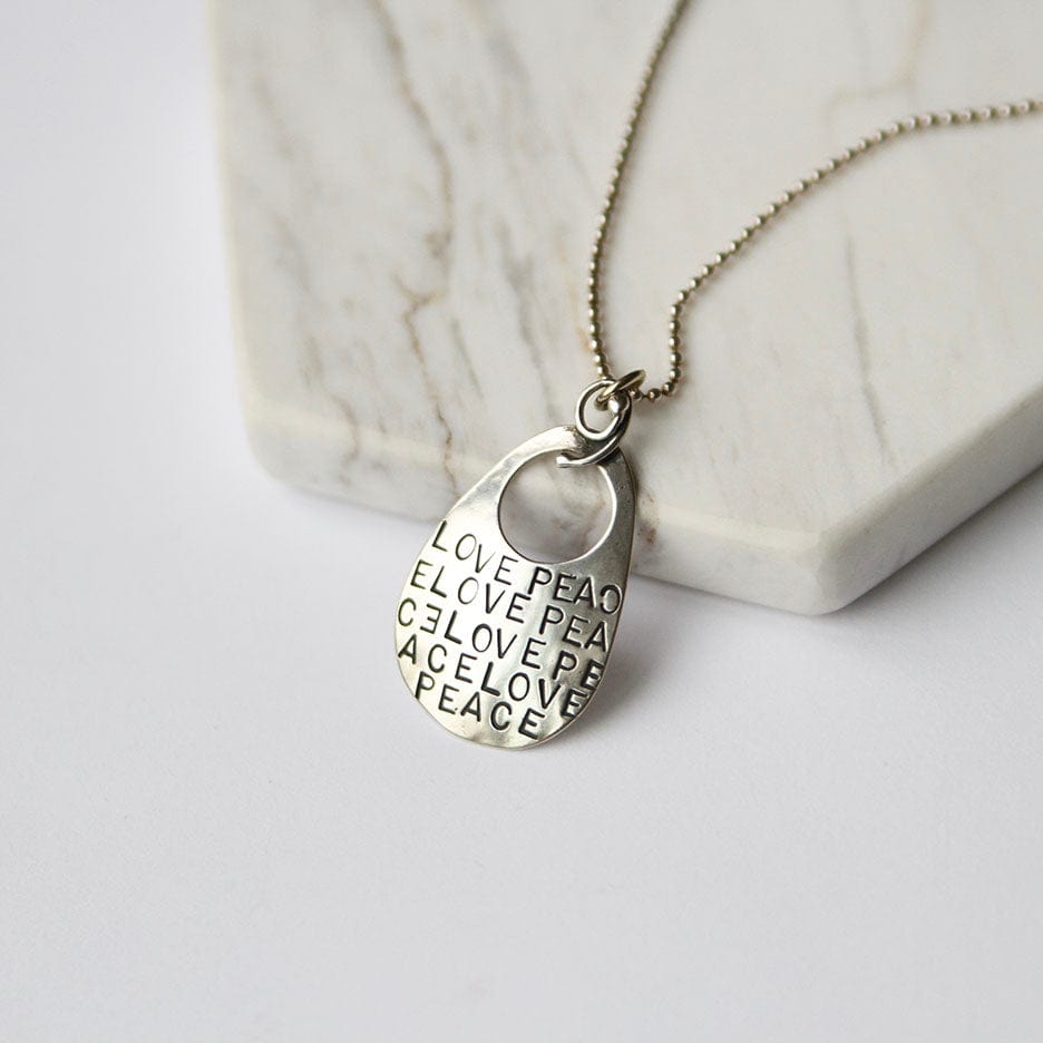 NKL "Love, Peace" Stamping Pendant