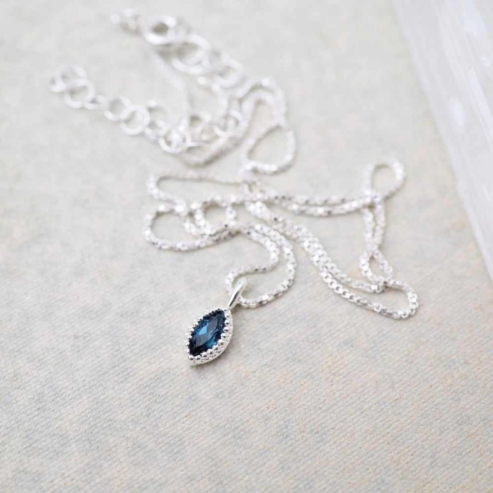 
                  
                    NKL Marquise London Blue Topaz with Milgrain Edge Necklace - Sterling Silver
                  
                