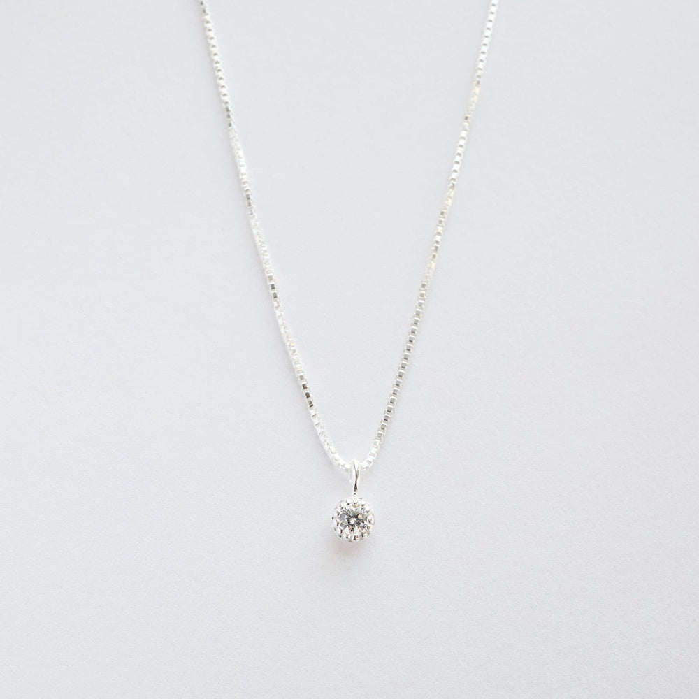 NKL Milgrain Edge Round CZ on Sterling Silver Box Chain