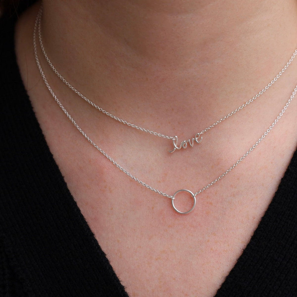 
                      
                        NKL Mini Cursive "love" Necklace
                      
                    