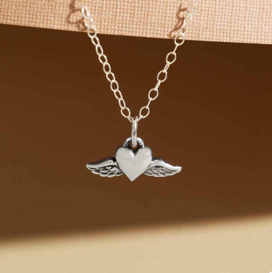 
                      
                        NKL Mini Flying Heart Pendant Necklace
                      
                    