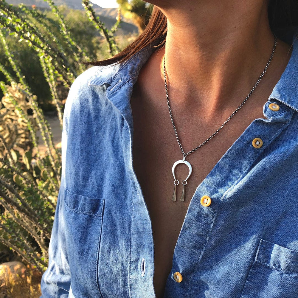 
                      
                        NKL Mini Moonrise Necklace
                      
                    