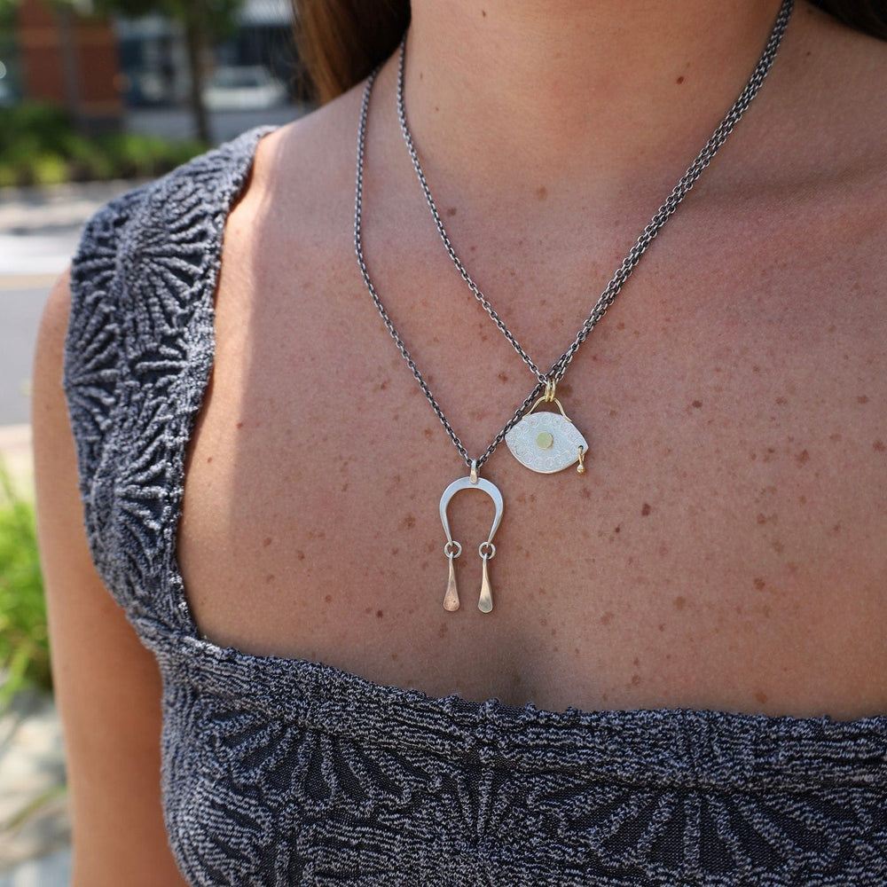 
                      
                        NKL Mini Moonrise Necklace
                      
                    