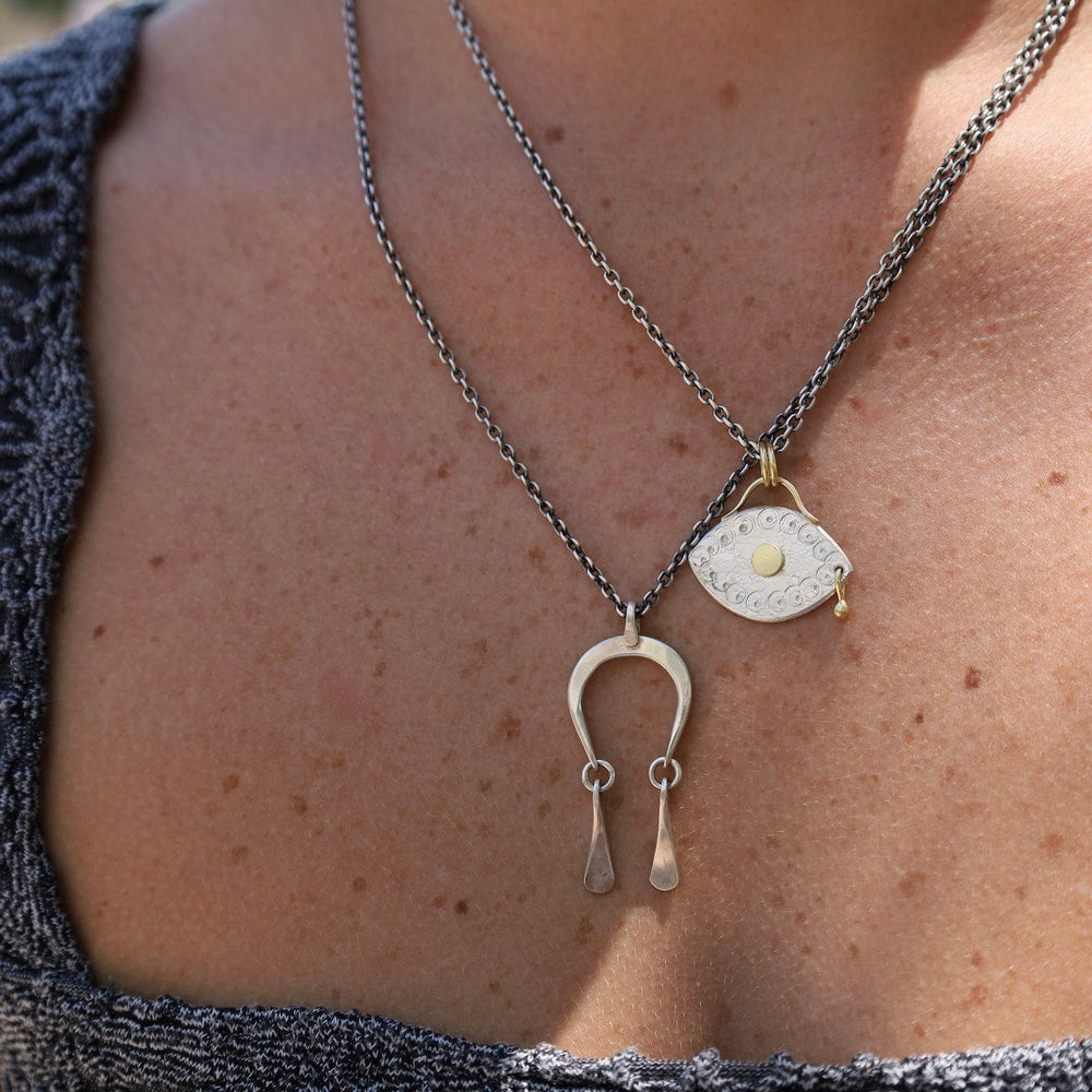 
                      
                        NKL Mini Moonrise Necklace
                      
                    