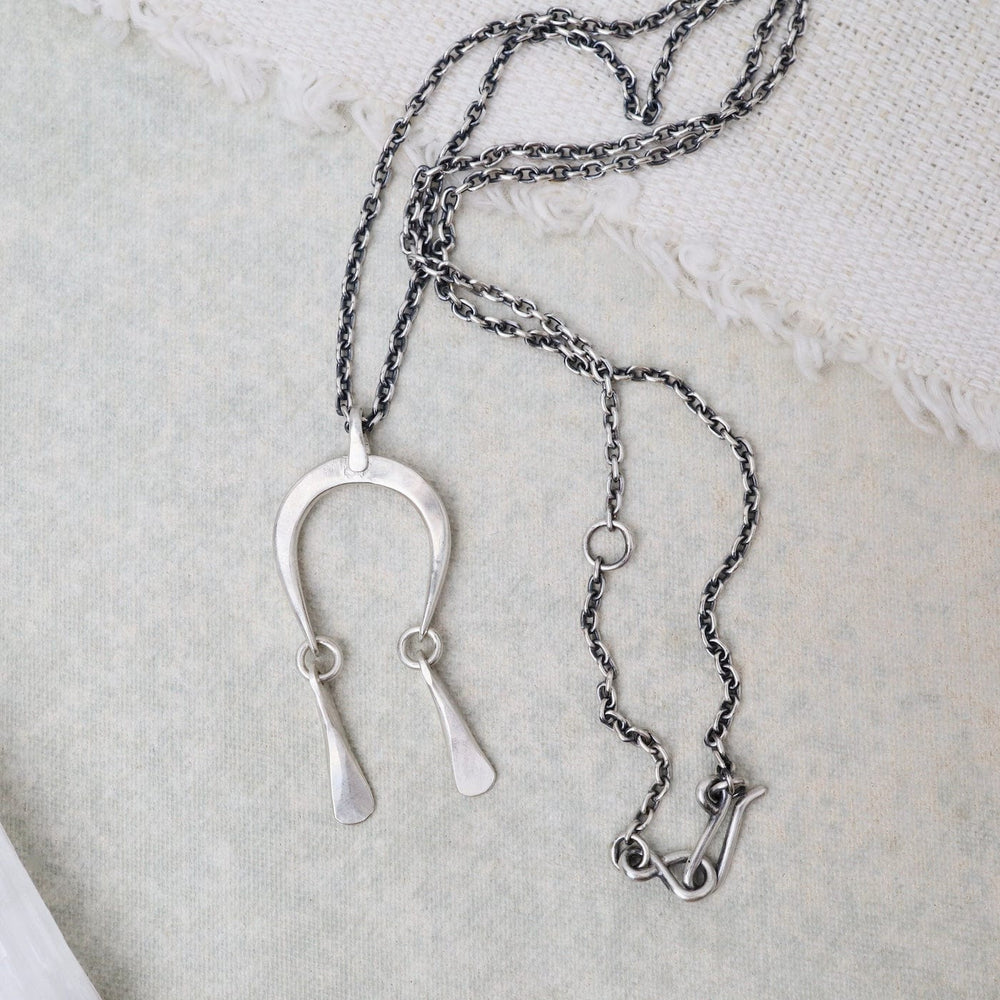 
                      
                        NKL Mini Moonrise Necklace
                      
                    