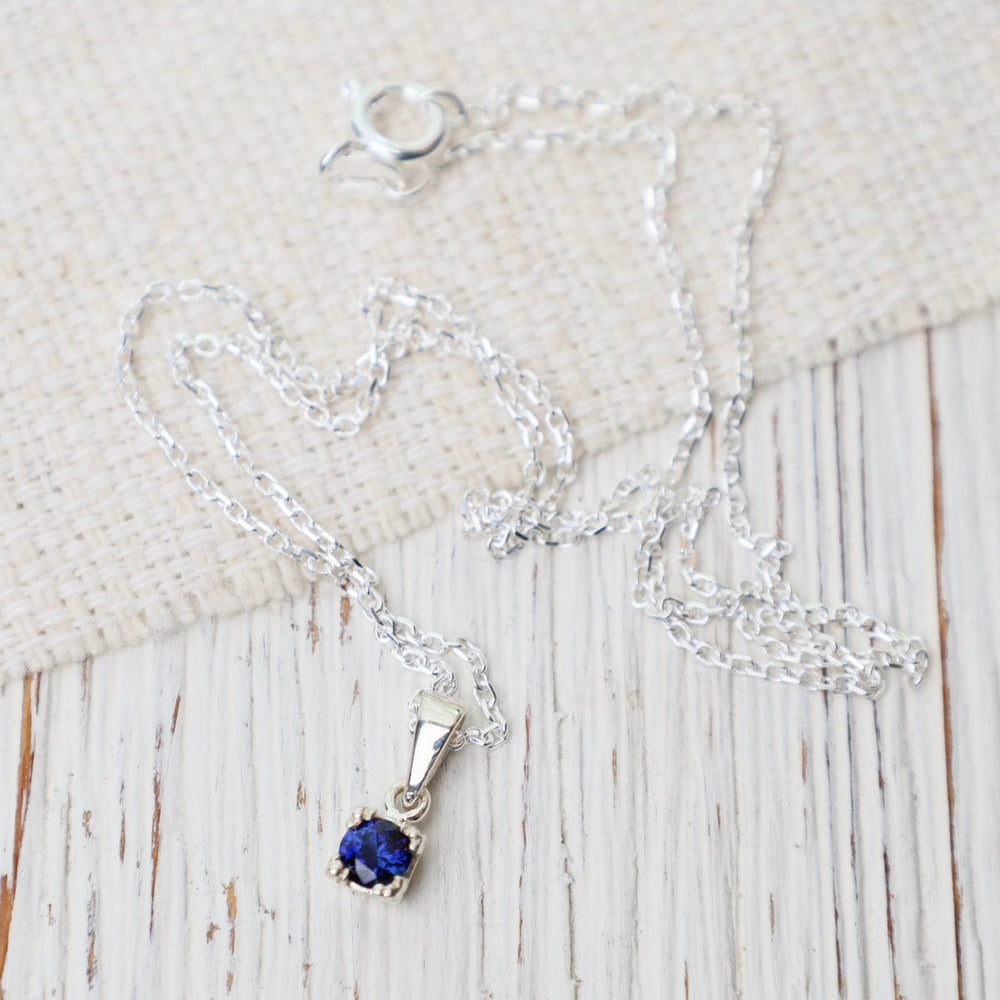 
                      
                        NKL Mini Synthetic Sapphire Pendant Necklace
                      
                    