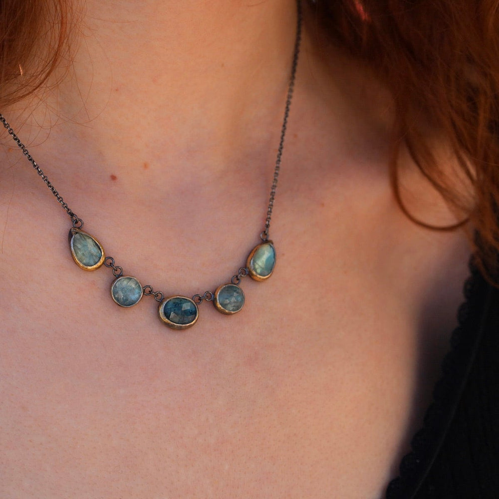 
                      
                        NKL Mixed Kyanite 5 Stone Rim Necklace
                      
                    