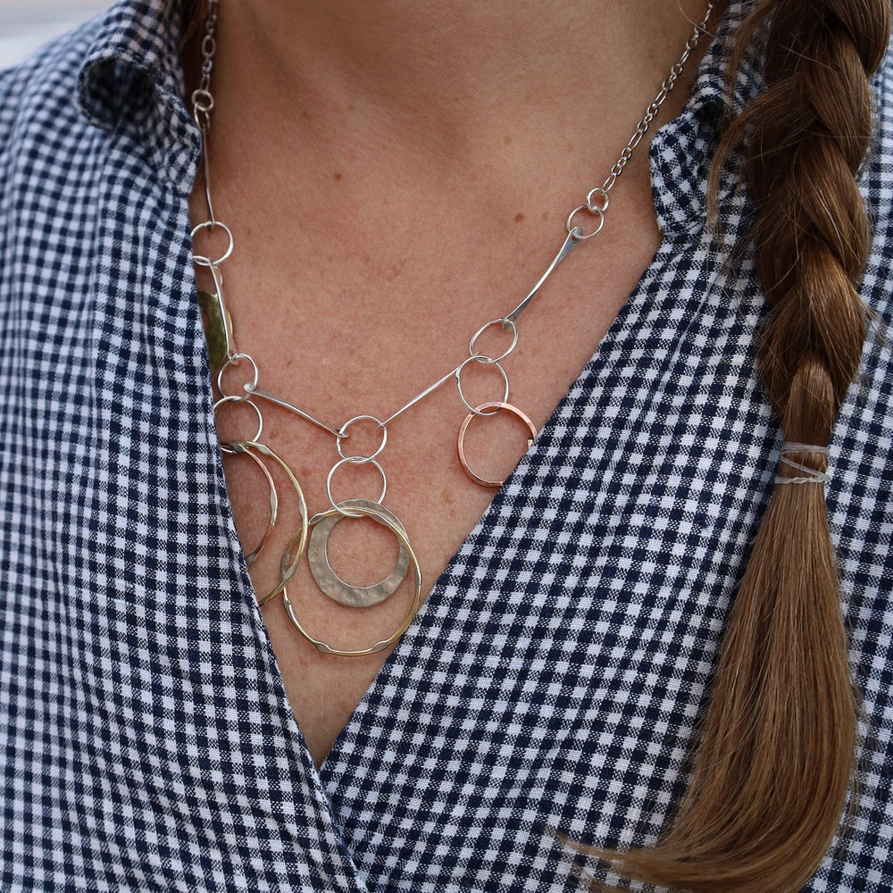 
                  
                    NKL Mixed Metal Dangly Circles Necklace
                  
                