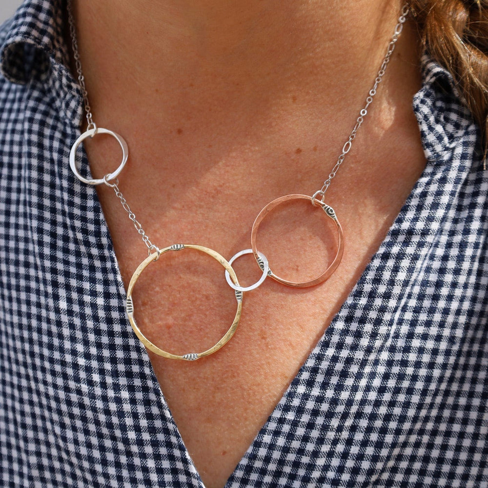 
                  
                    NKL Mixed Metals Random Circles Necklace
                  
                